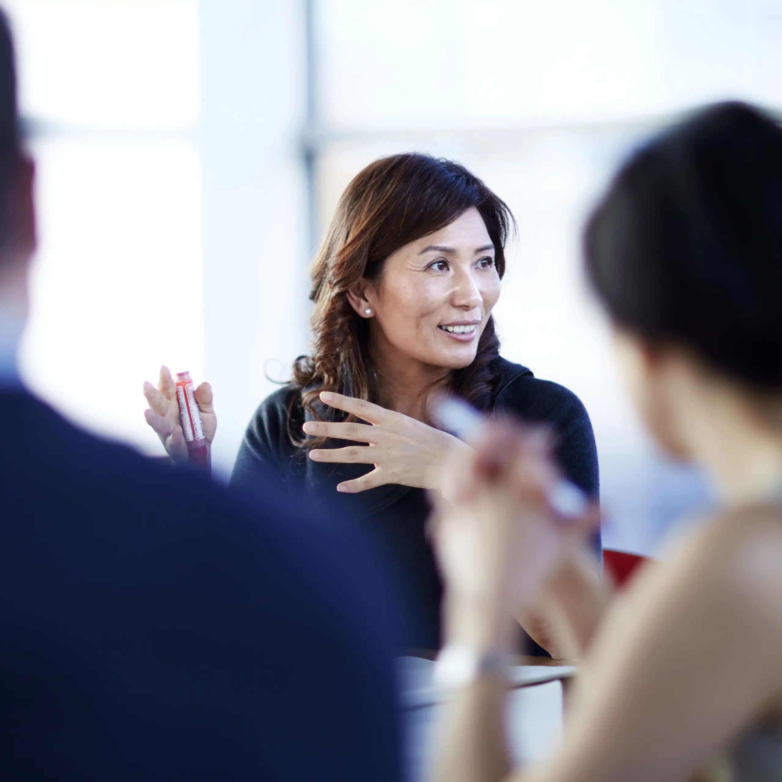 Business people talking in meeting