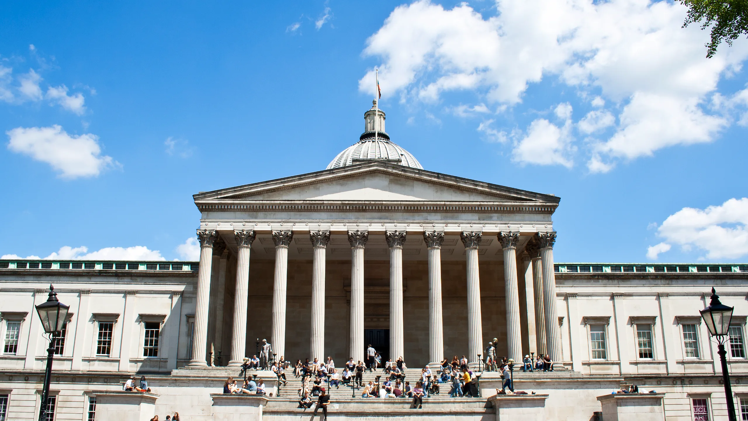UCL man building on a sunny day