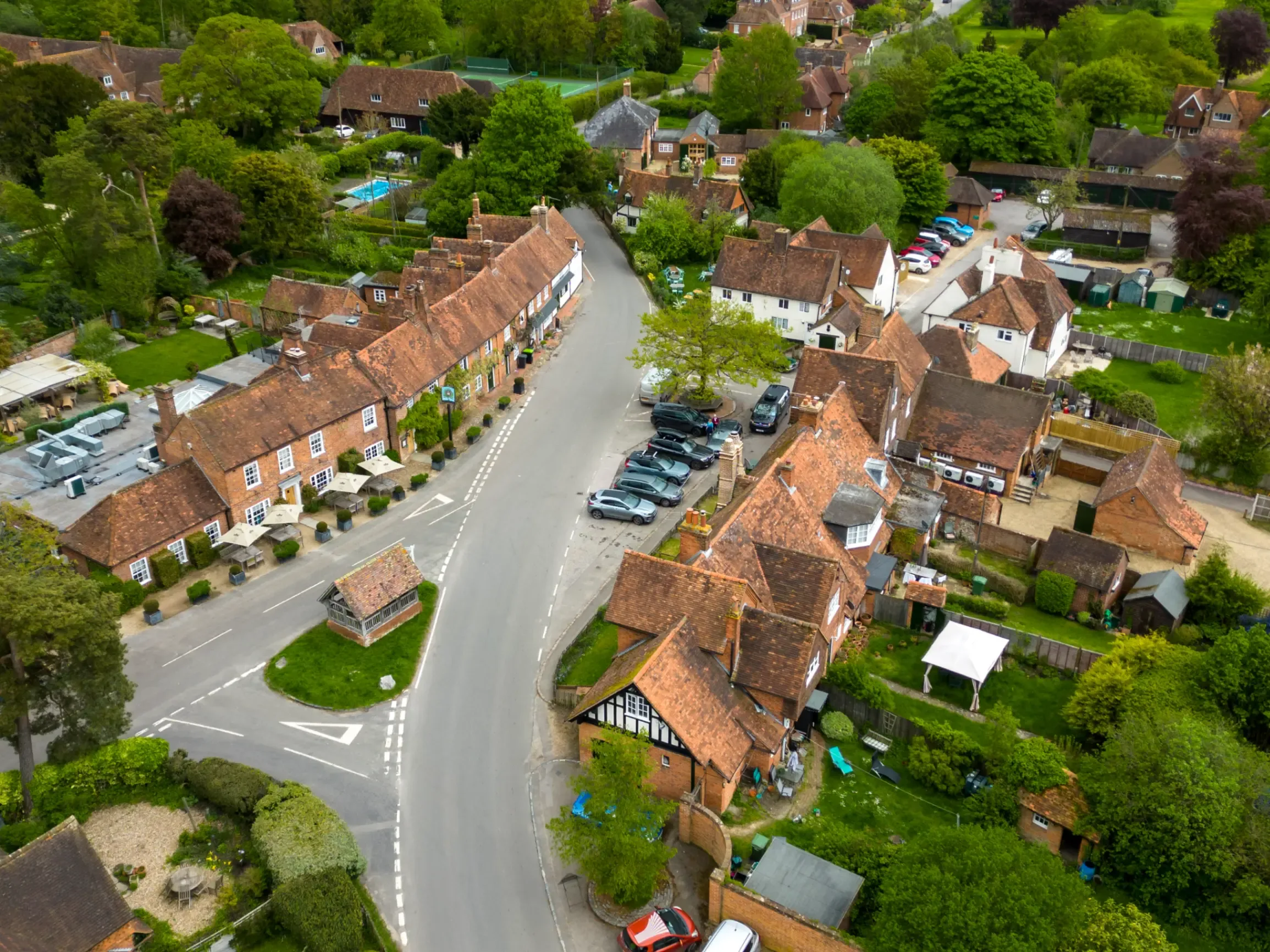 collection-of-houses-with-roads-and-cars-in-between