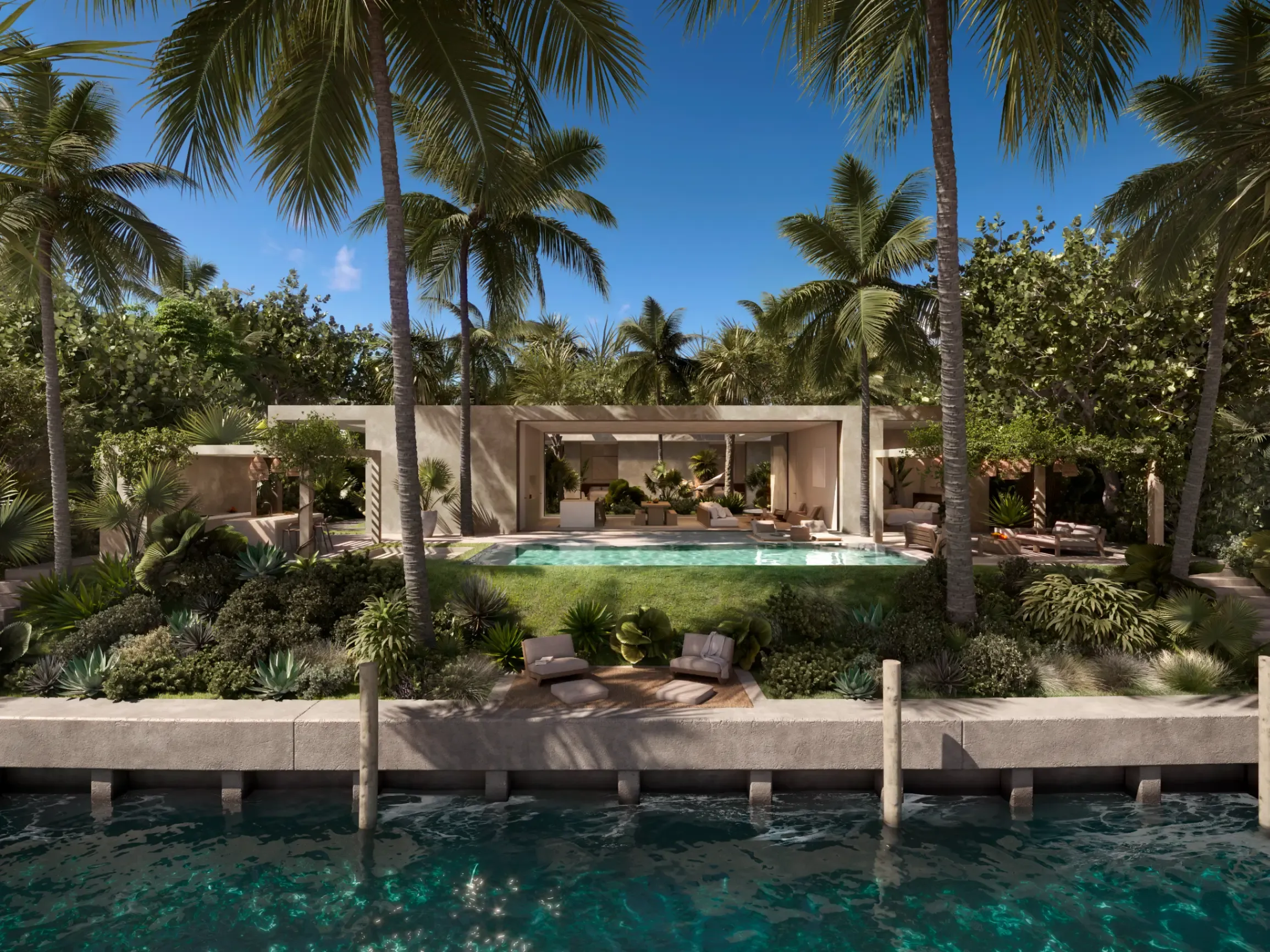 exterior of waterfront villa with palm trees, a swimming pool and garden
