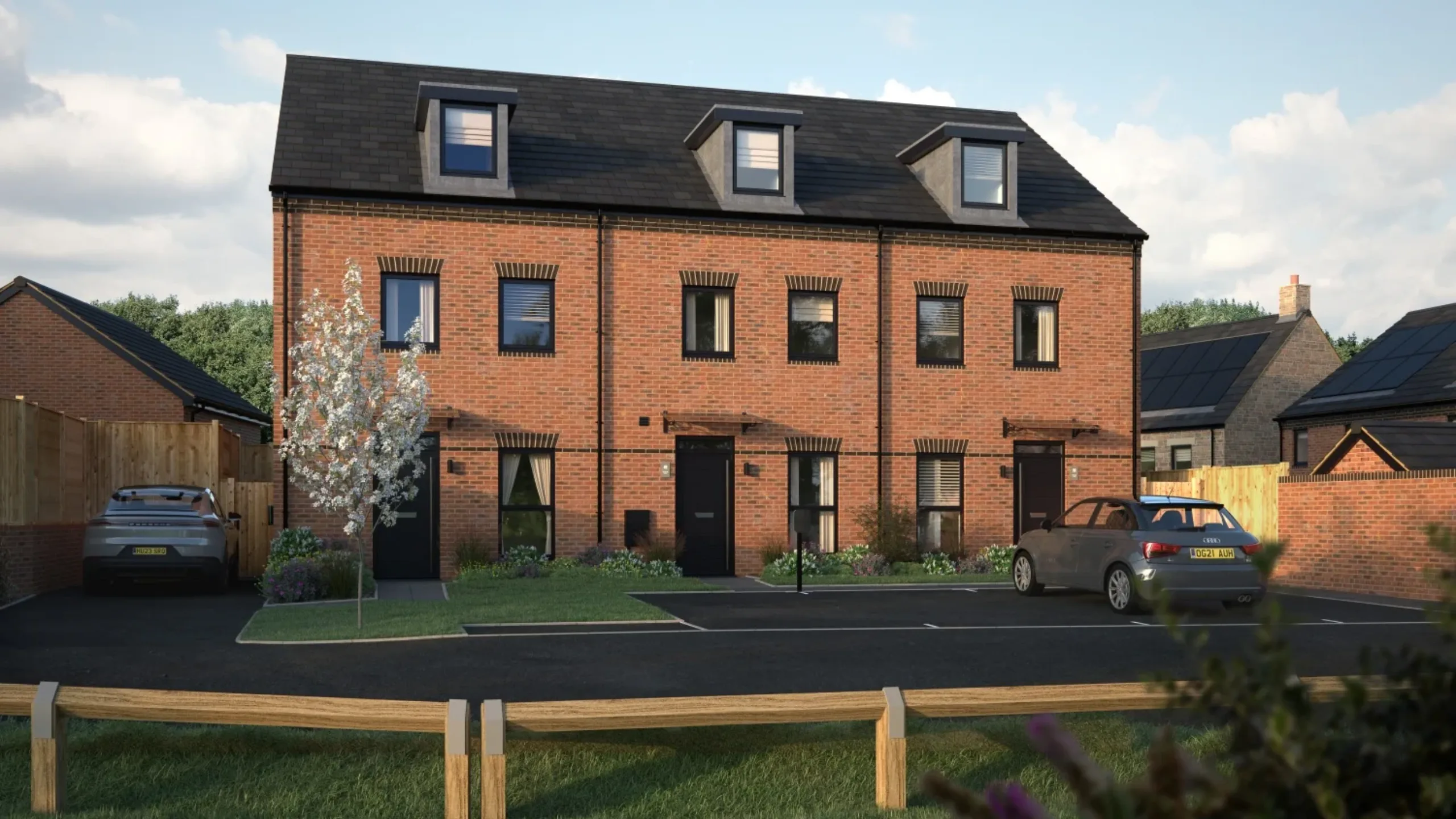 Exterior of new build home with 2 cars in the driveway