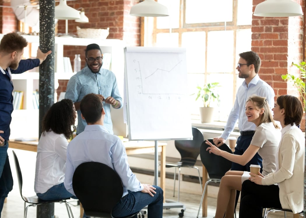 people in the office having a meeting