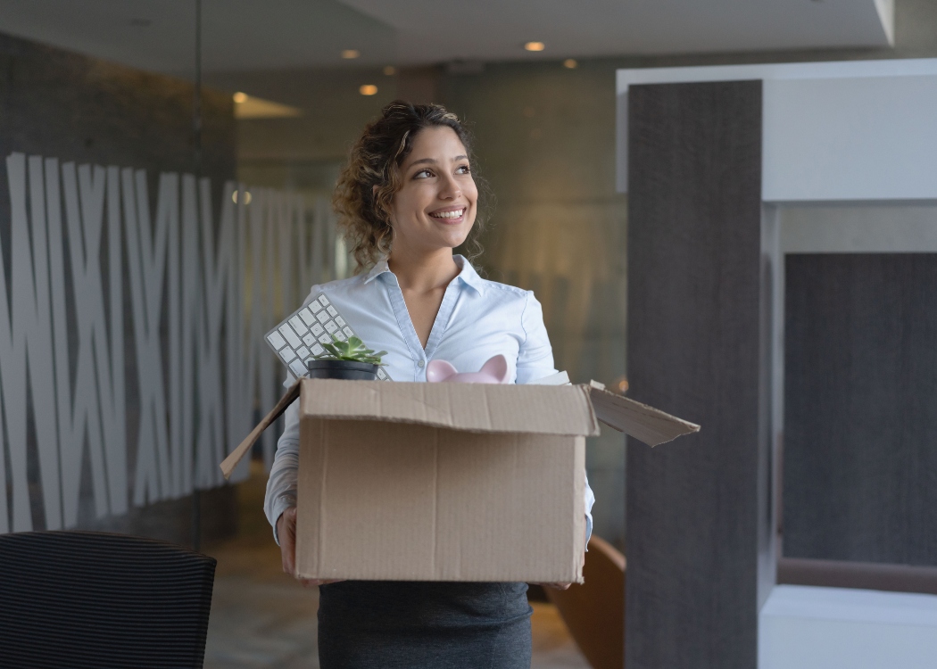 Woman moving into an office