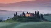 Farm house in Tuscany at sunrise