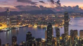 Sunrise view from Victoria Peak across the Hong Kong skyline.