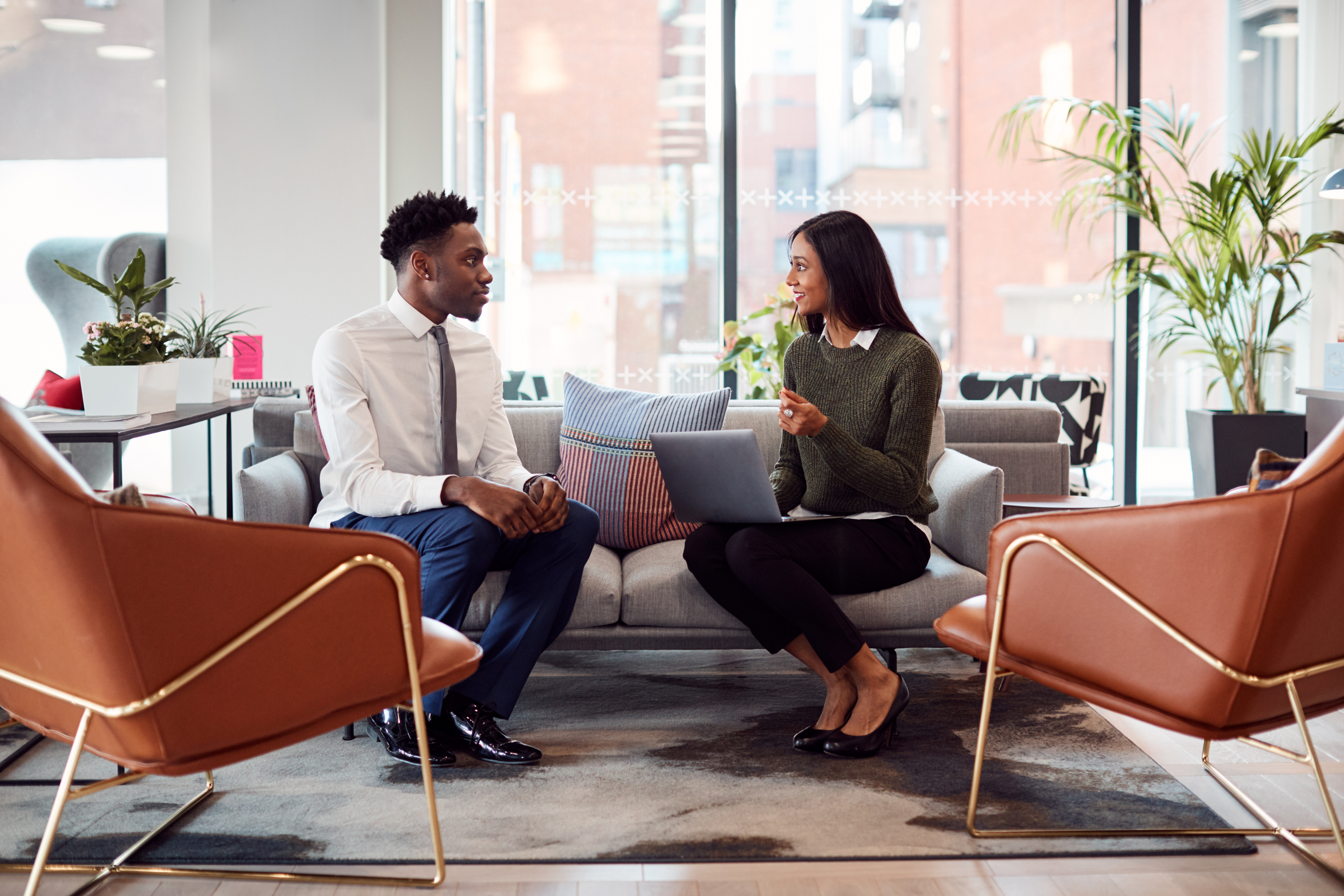 People in a meeting in a modern office environment. 
