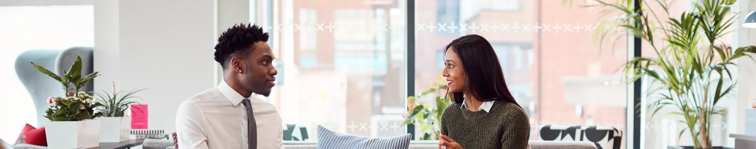 People in a meeting in a modern office environment. 