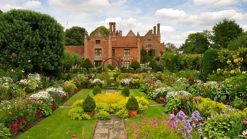 The beautiful award winning gardens of Chenies Manor in Buckinghamshire with a wide variety of flowering plants and shrubs.