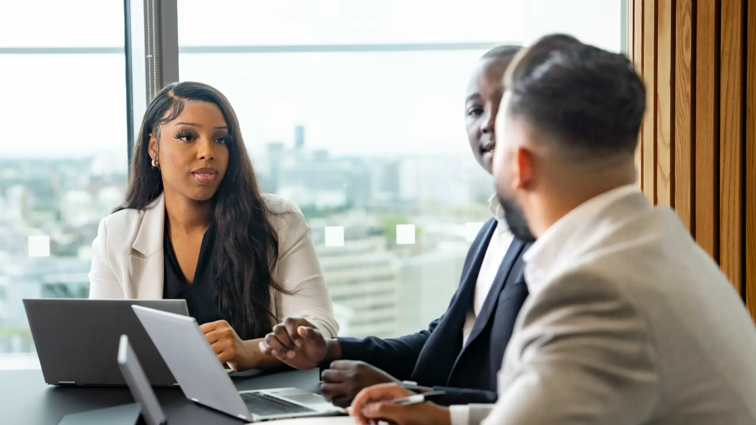 Diverse group of colleagues attending a business meeting
