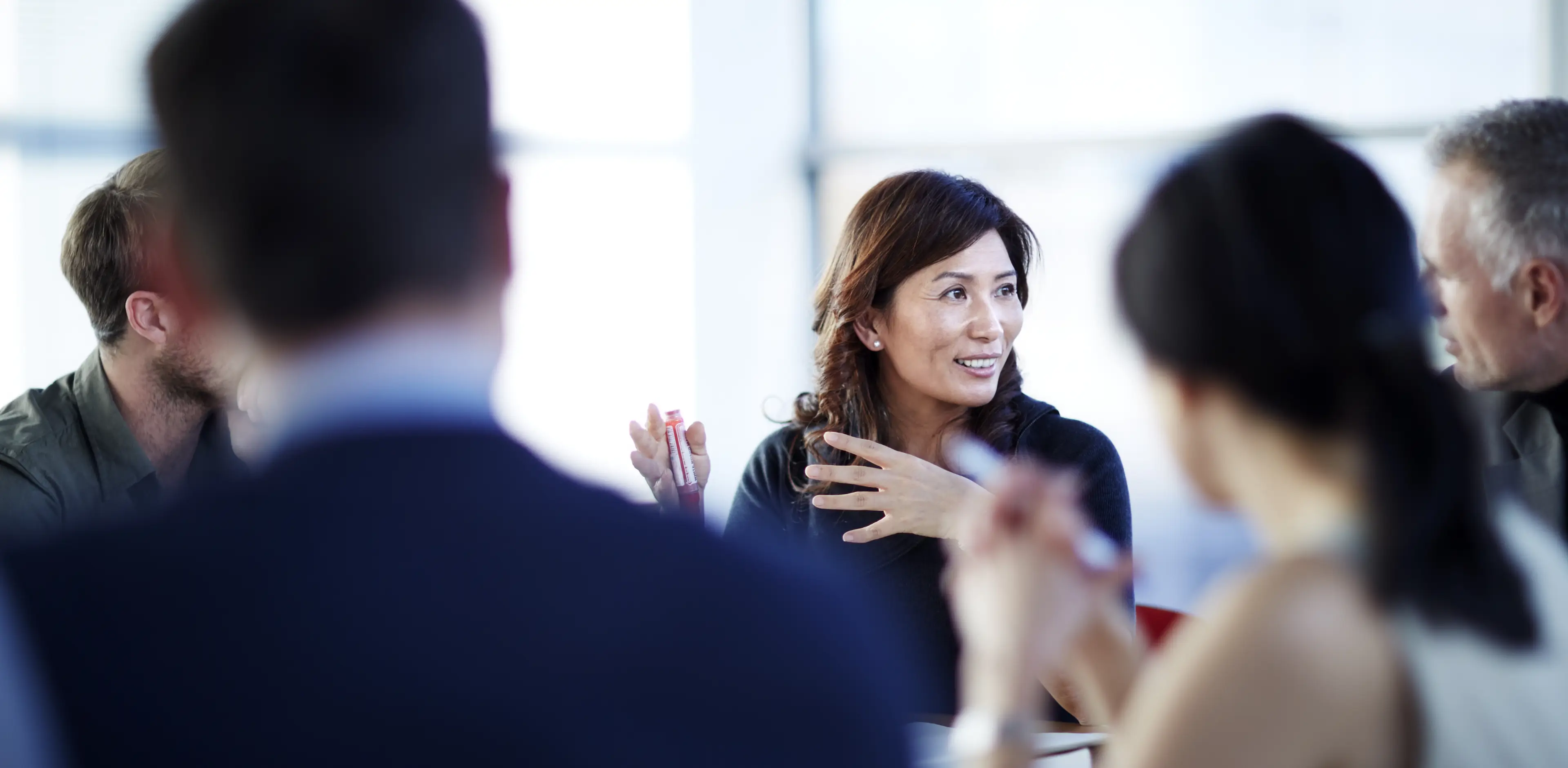 Business people talking in meeting
