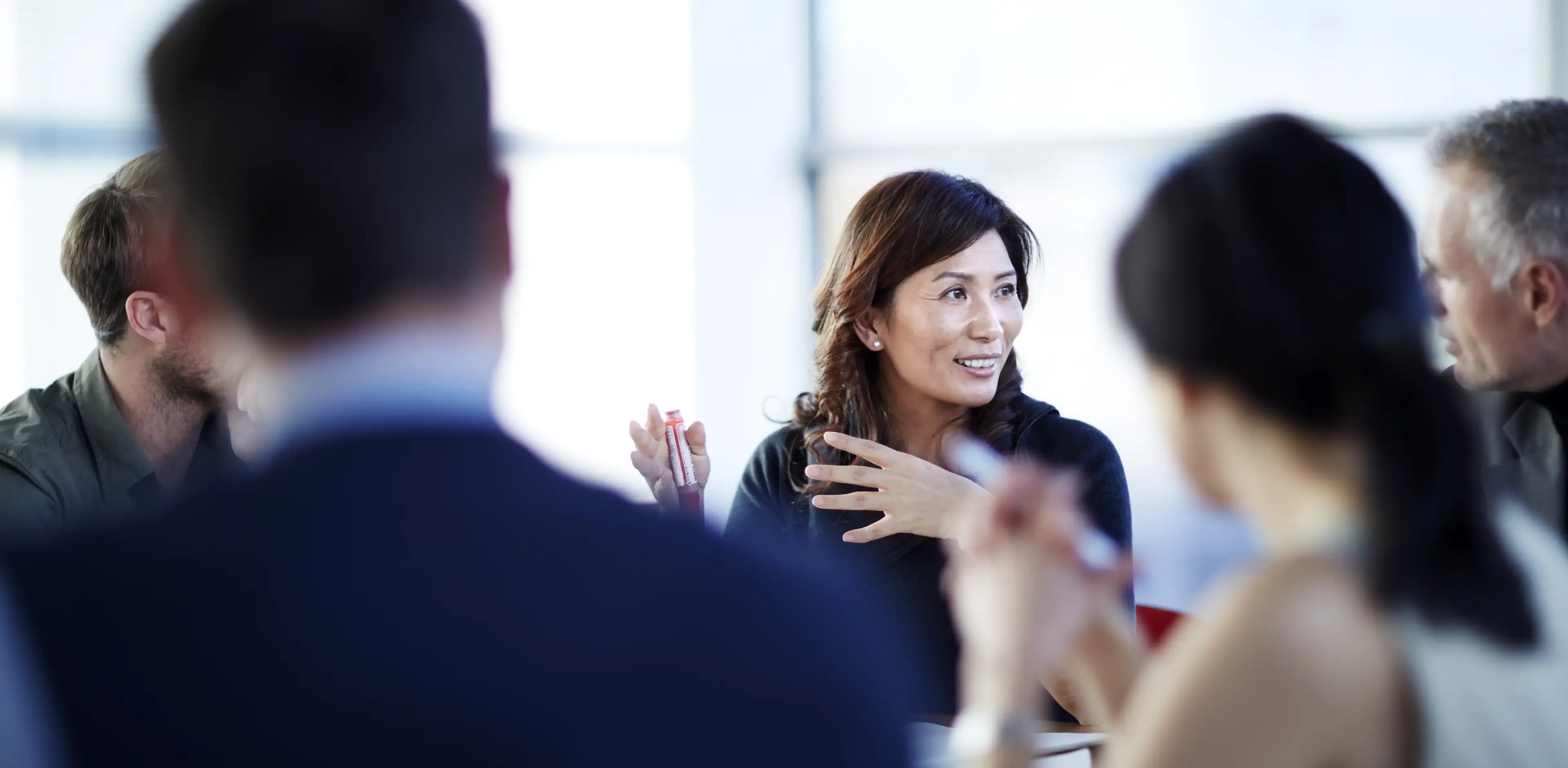 Business people talking in meeting