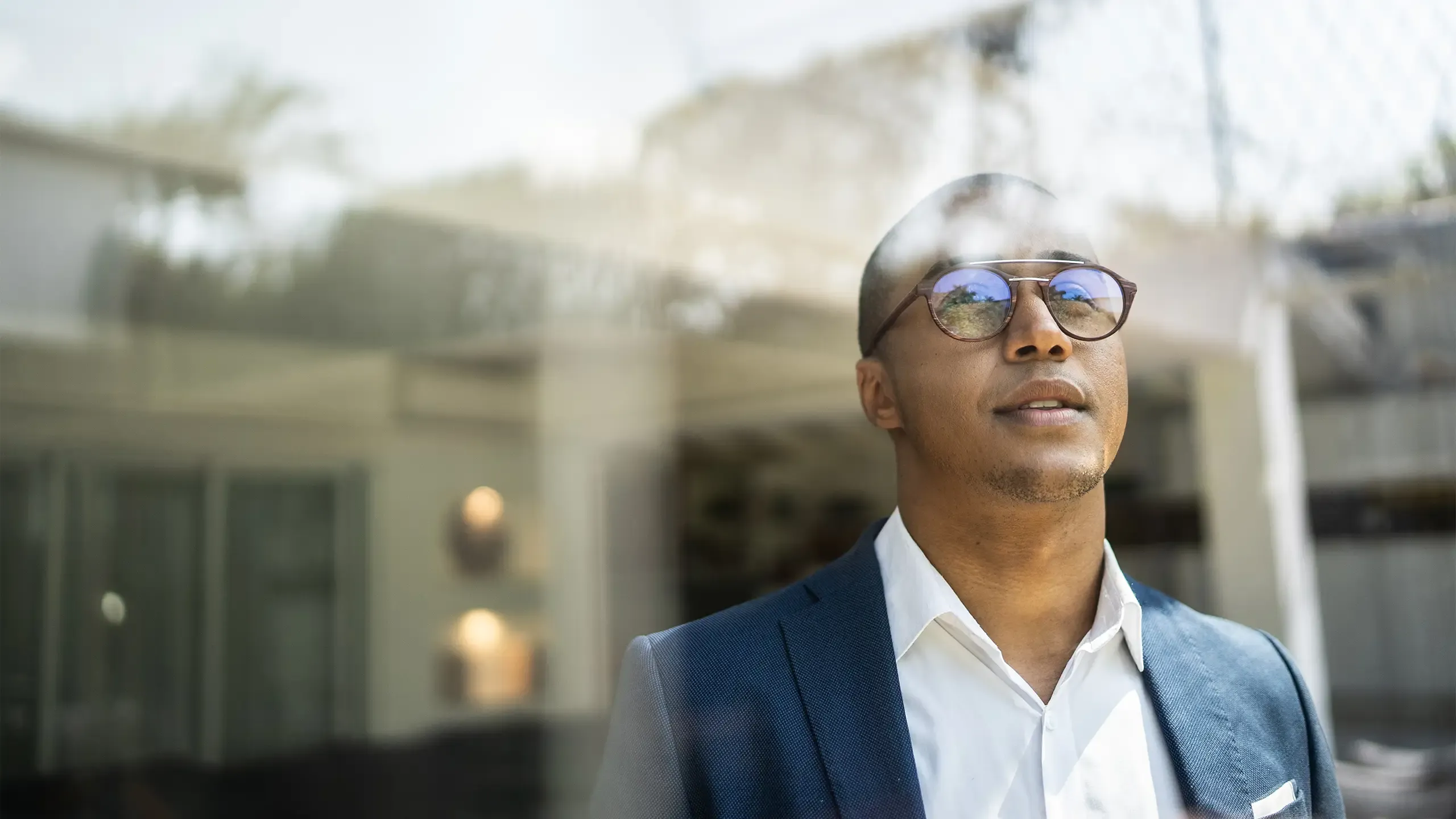 Businessman looking out of a window