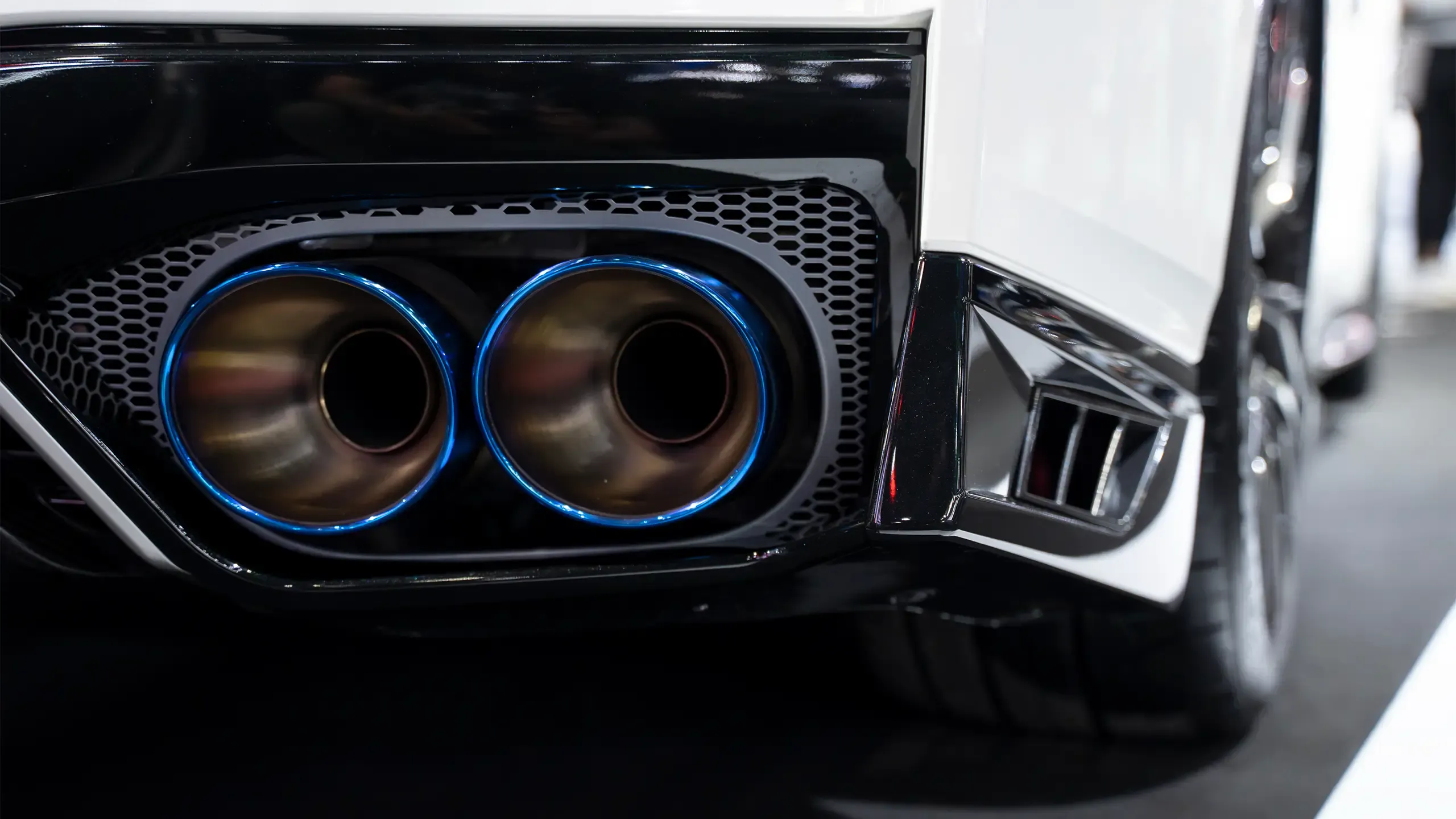 Close up of a car dual exhaust pipe