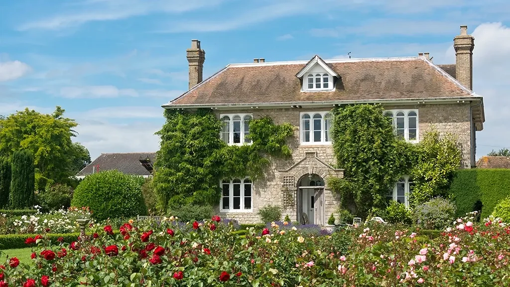 A Picturesque English country cottage with rose garden, located in an English Village.