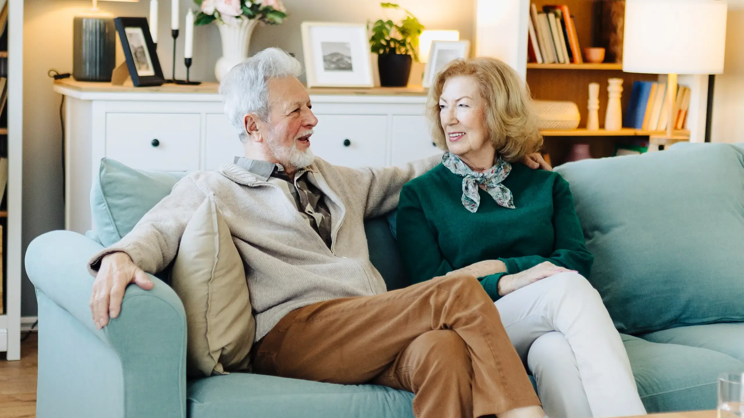 Portrait of smiling senior couple at home