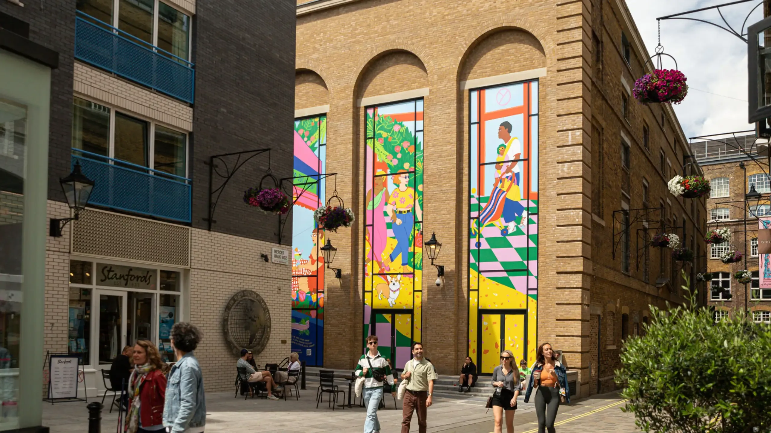 Shoppers walking through The Yards in Covent Garden