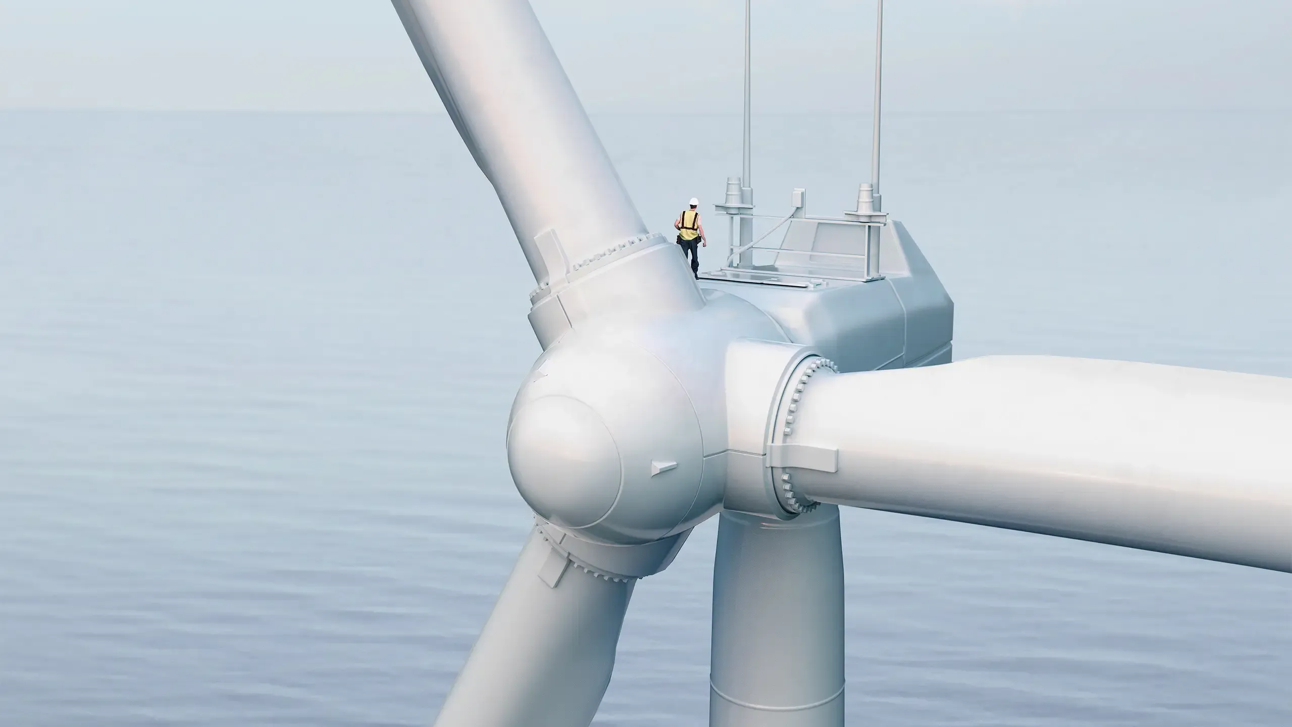 Wind turbine in the blue sea with a technician