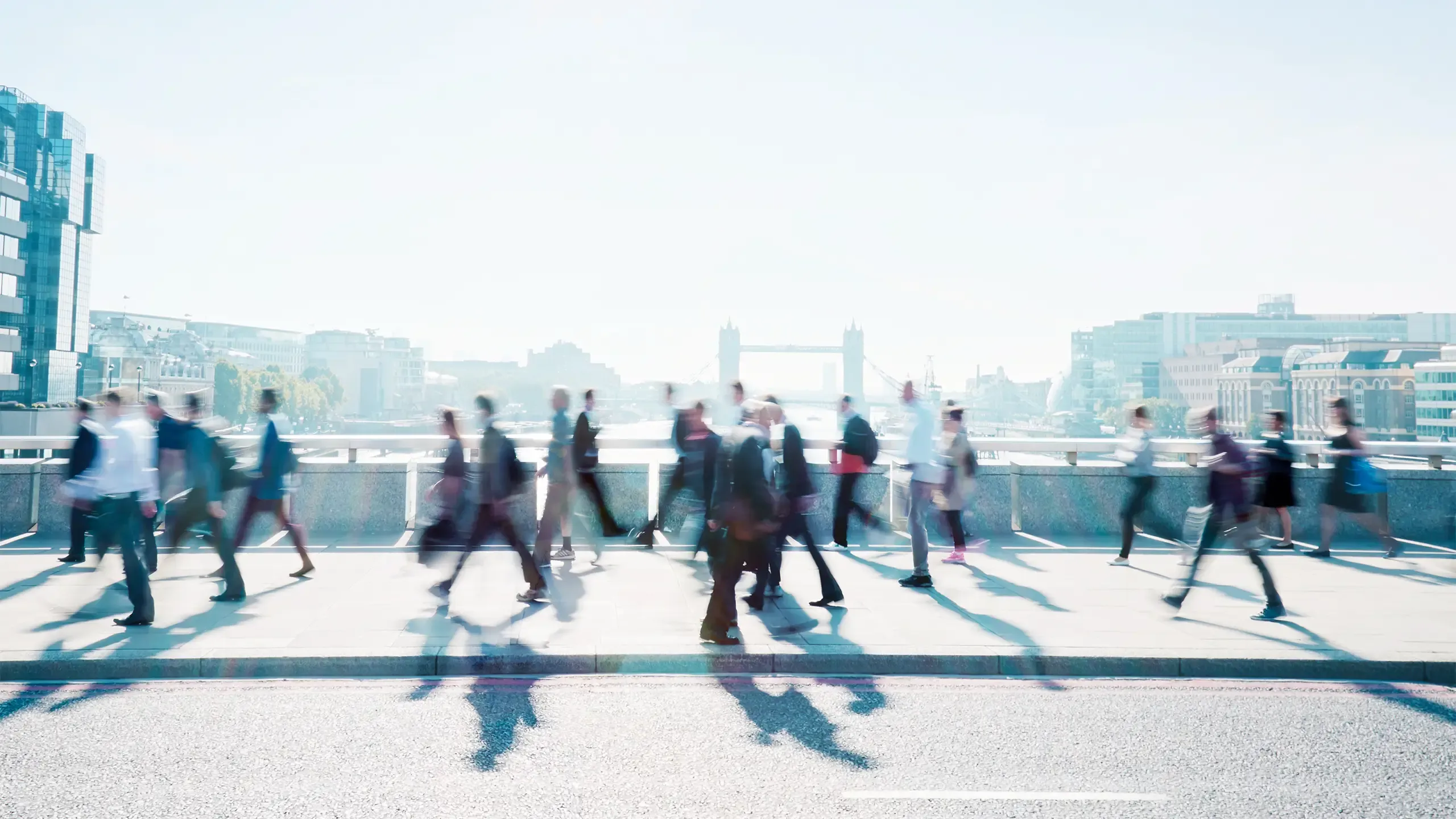 Workers walking to work through London city