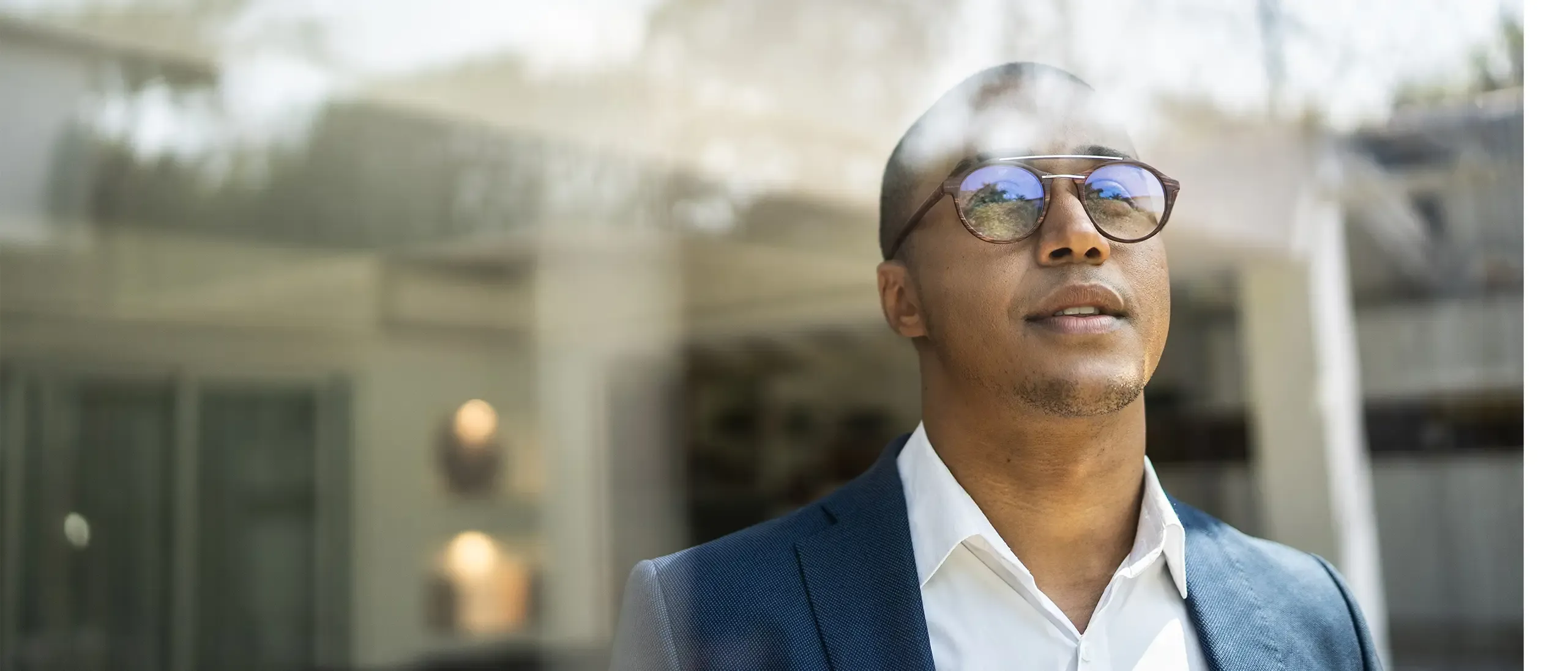 Businessman looking out of a window