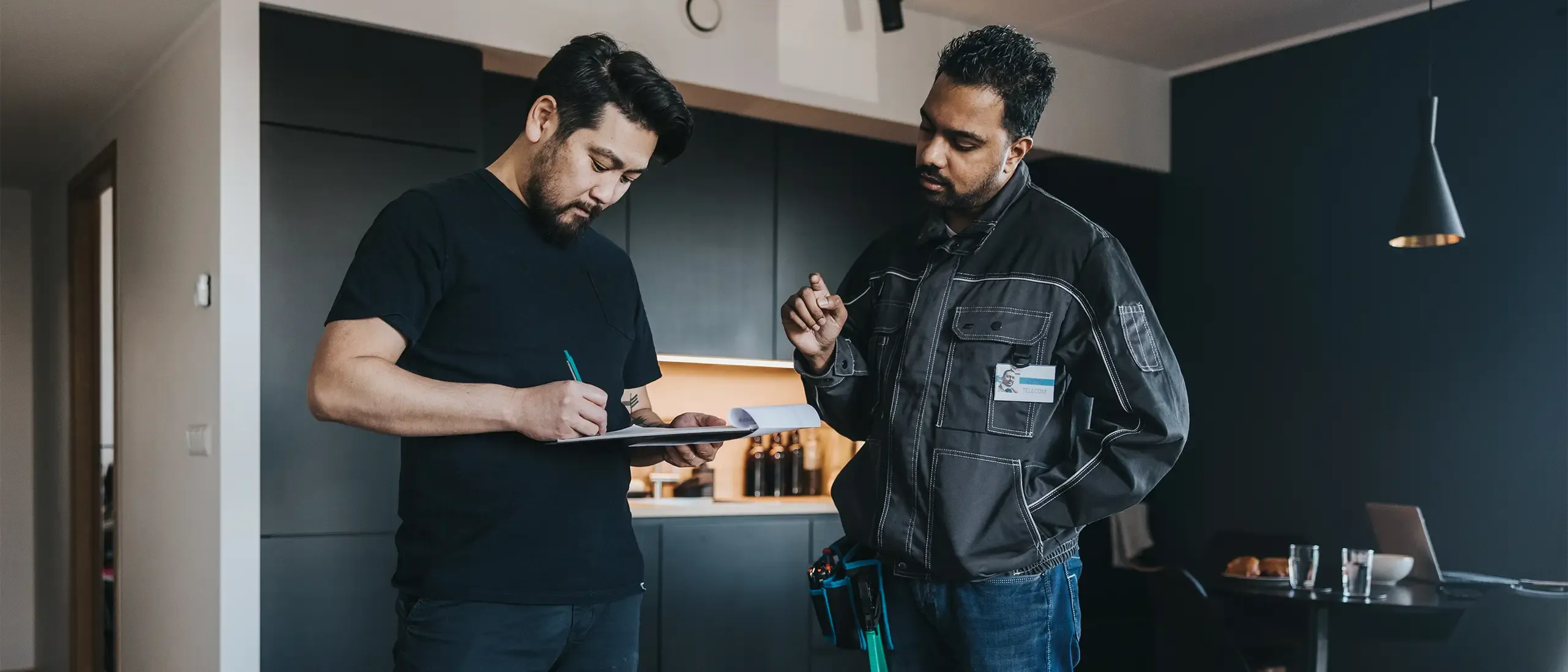 Japanese customer signing network contract at home.