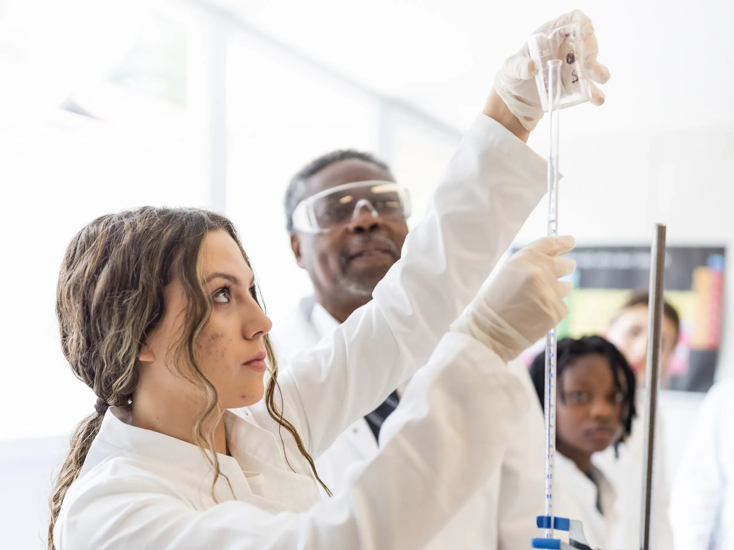 Group of high school students in a chemistry class