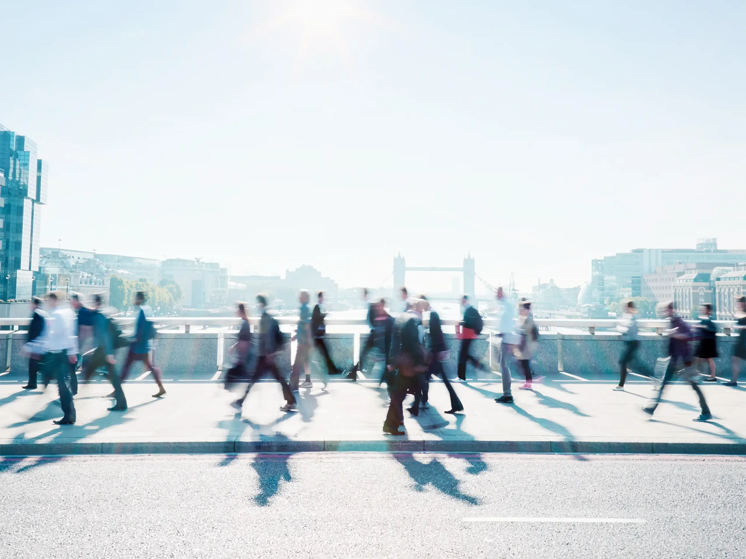 Workers walking to work through London city