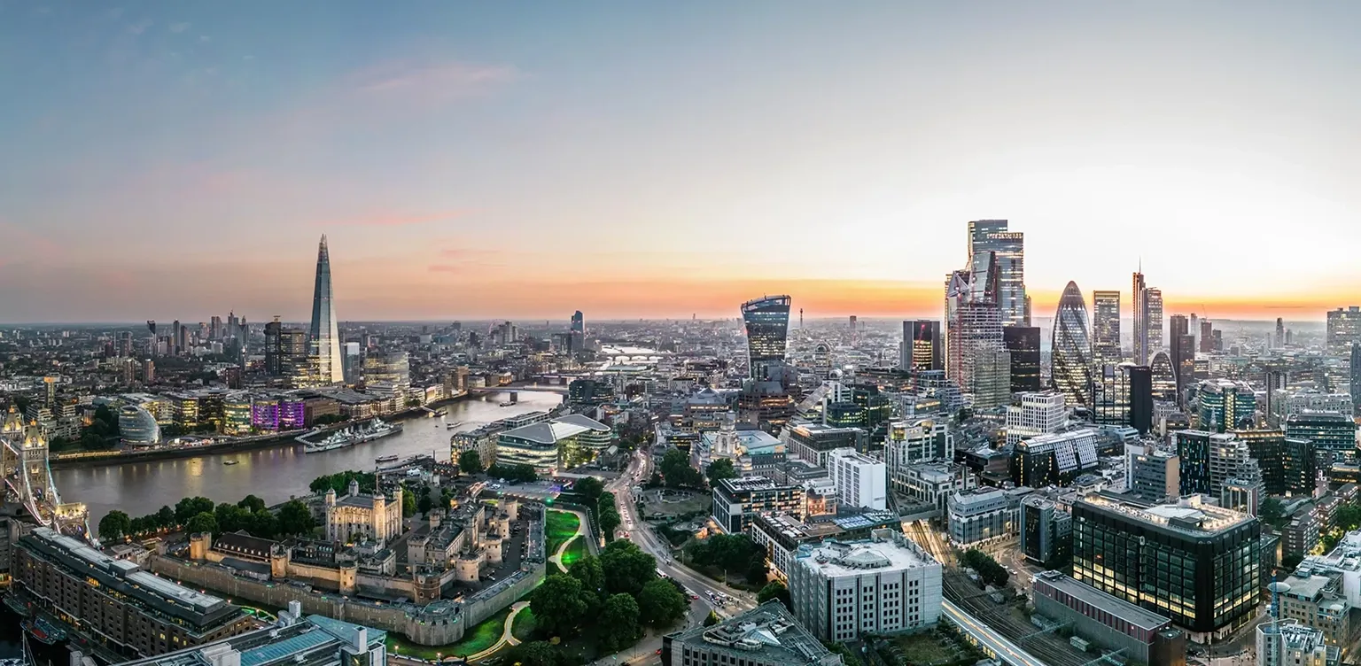 A panoramic view of London with Tower Bridge, the River Thames, the Shard and the Tower of London