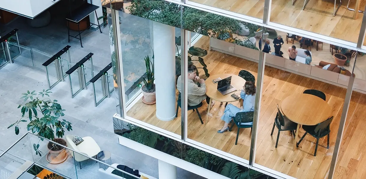 Diverse business leaders in a modern office cafe