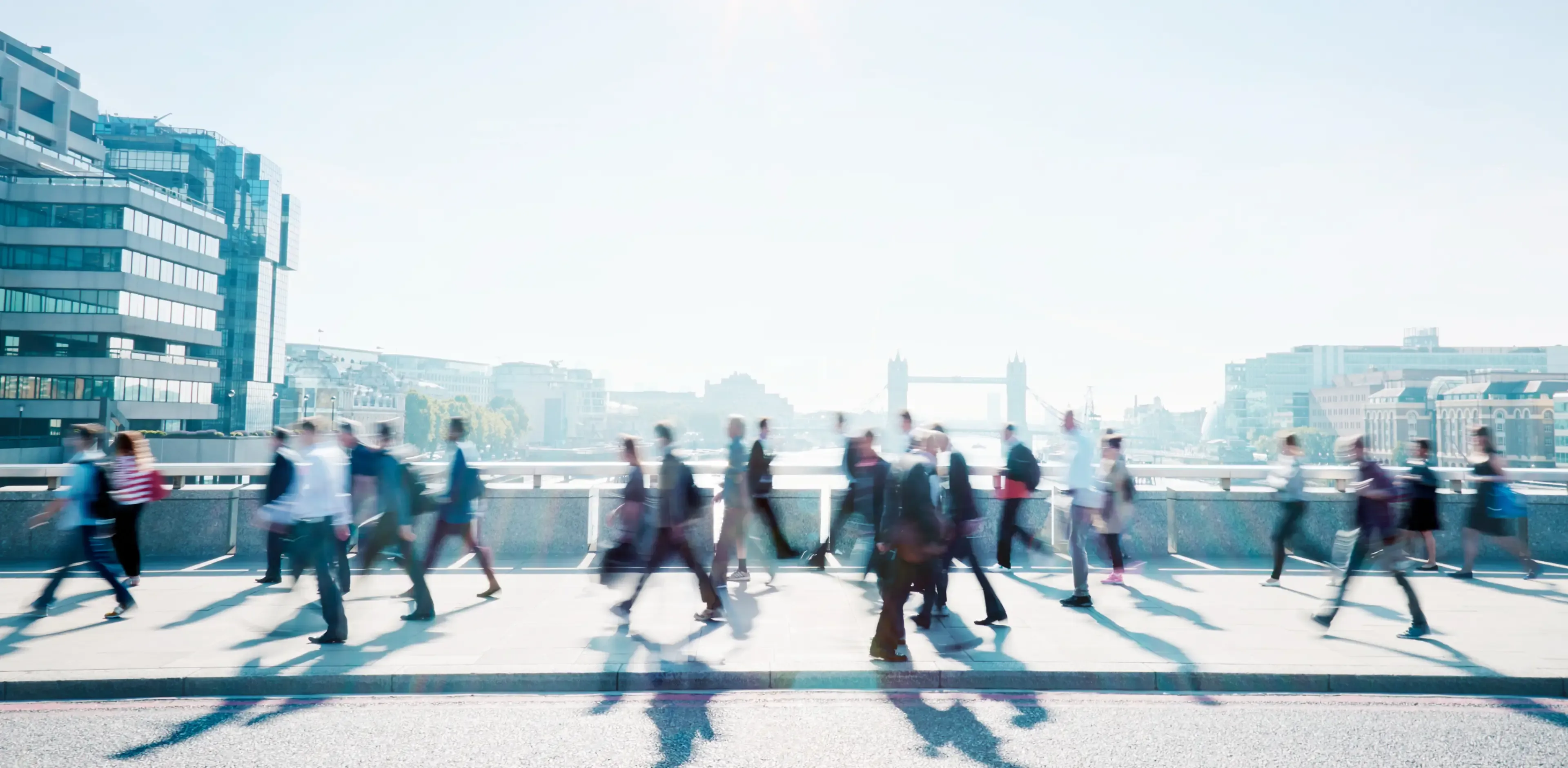 Workers walking to work through London city