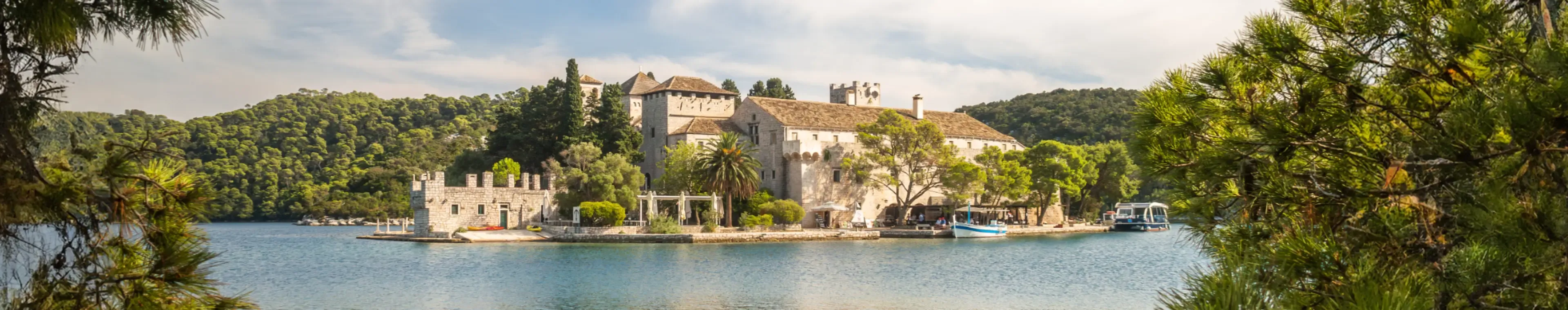 Picture shows the benedictine monastery of the Saint Mary Island, located on a side of the Veliko Jezero ("The Great Lake"), the largest salt lake of the Mljet National Park. The monastery was founded during the XIIth century and lasted until 1809 when it was disbanded by Napoleon. It is one of the most iconic location in the park, only accessible by boat.