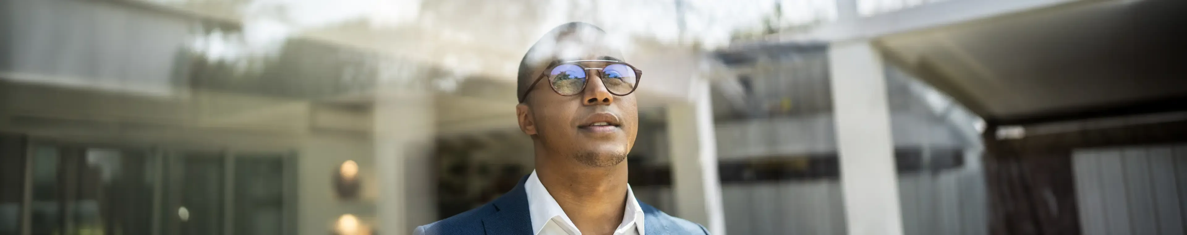 Businessman looking out of a window