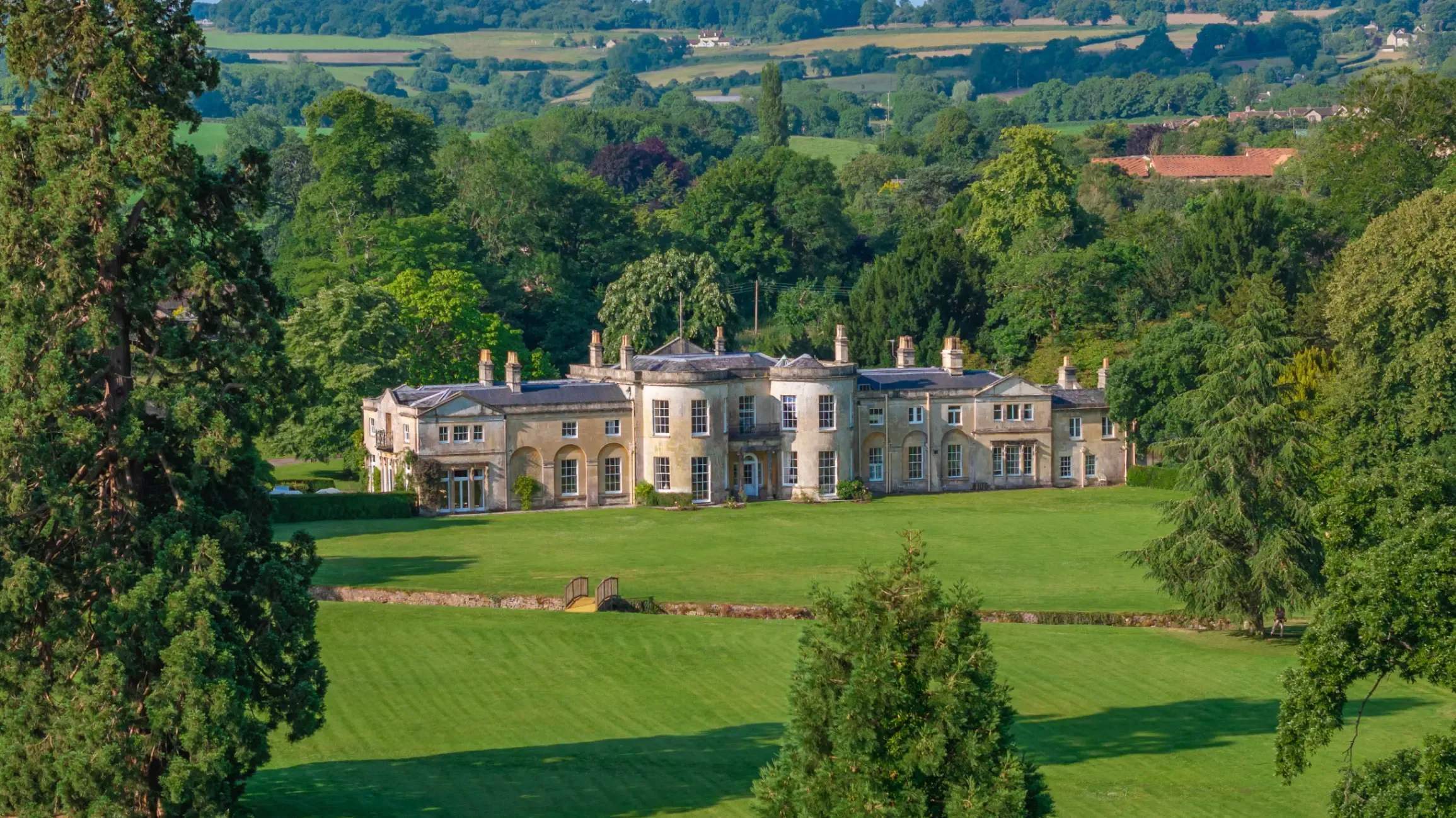 A beautiful country house in rolling green countryside. 