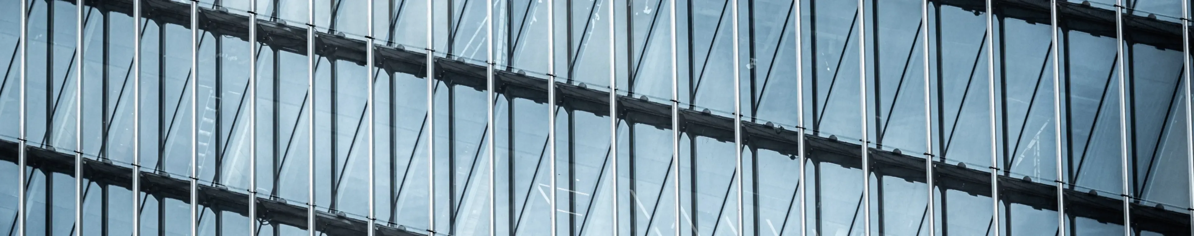 Modern office exterior facades with clouds reflections. Abstract business background