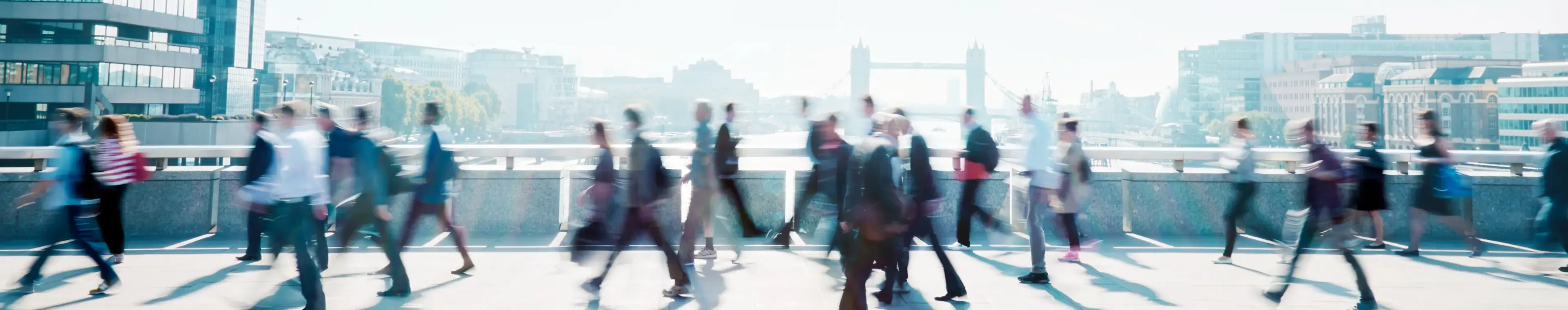 Workers walking to work through London city