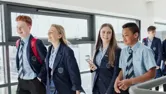High school students walking to their next class.