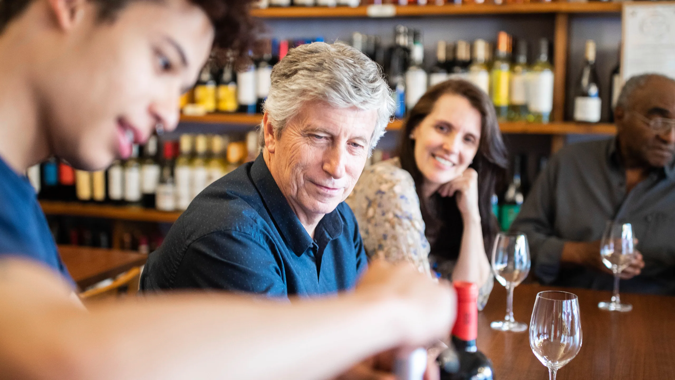 mature couple during wine tasting session