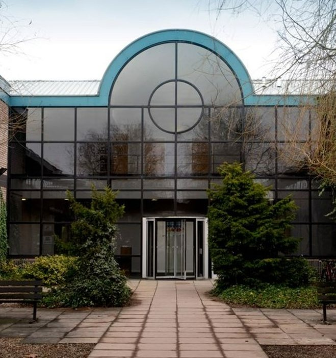 The exterior of a modern office building. 