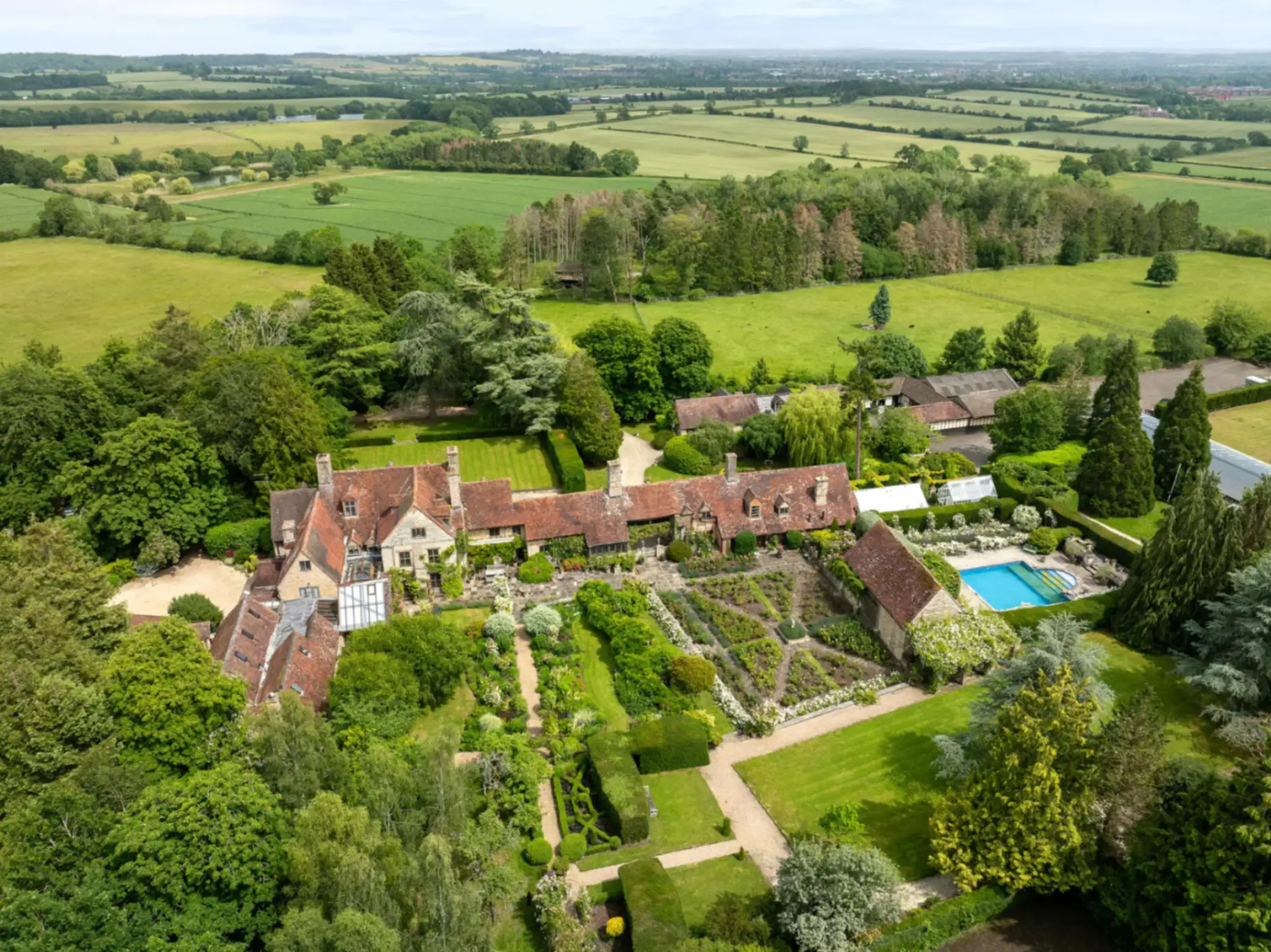 A view of Upper Billesley House, near Stratford-upon-Avon, from above