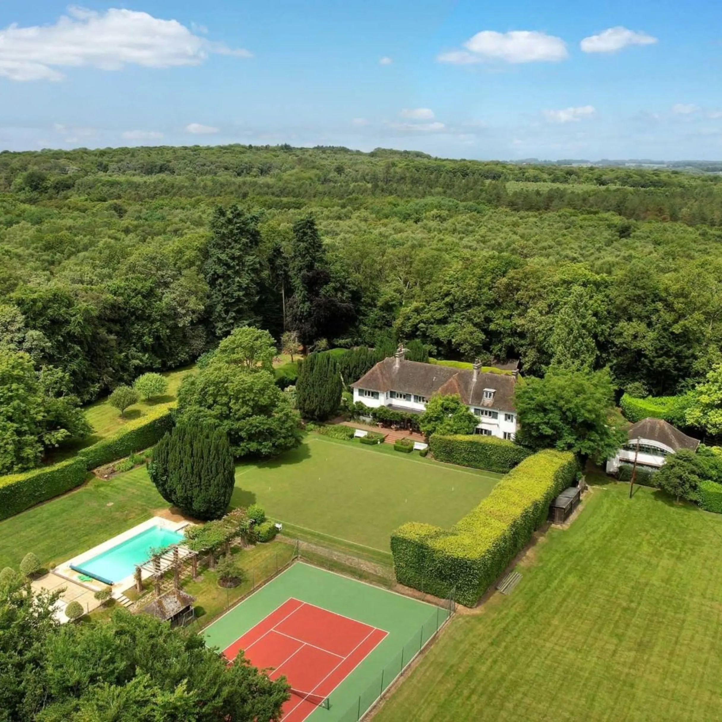 Serving up style: Homes for sale across the UK with tennis courts